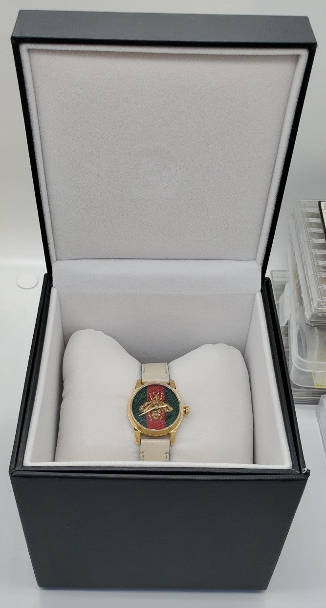 Gucci G-Timeless 27mm Gold-Tone Stainless Steel Case with Off White Leather Band
