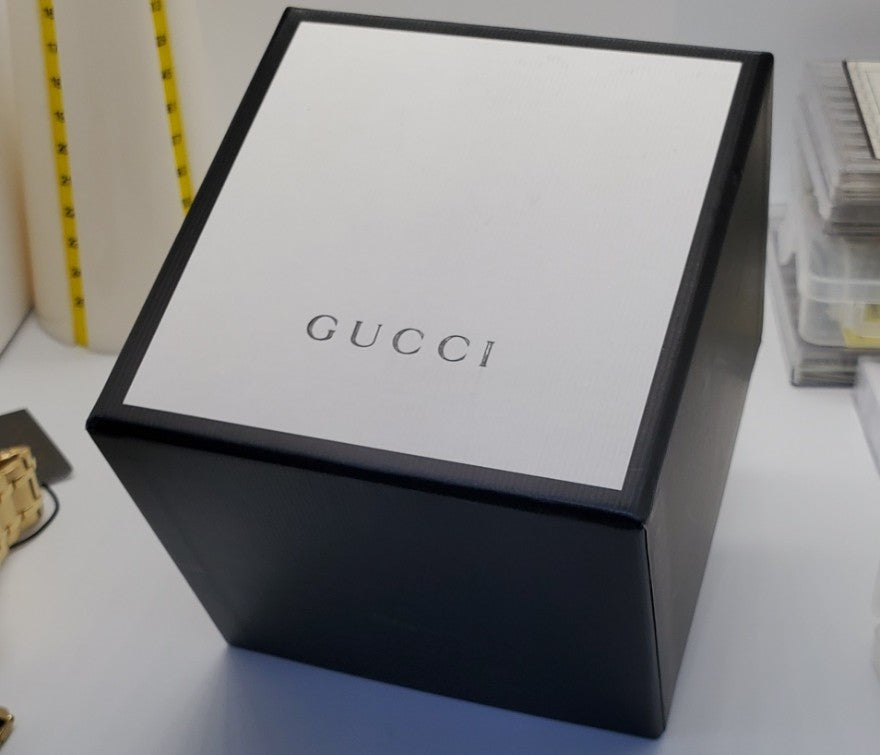 Gucci G-Timeless 27mm Gold-Tone Stainless Steel Case with Off White Leather Band